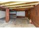 Unfinished two-car garage with wood paneling at 615 16Th Nw St, Largo, FL 33770