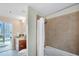 Clean bathroom with bathtub, shower, and neutral color scheme at 777 N Ashley Dr # 2612, Tampa, FL 33602