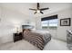 Bright bedroom with double bed and ceiling fan at 960 Starkey Rd # 2501, Largo, FL 33771