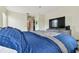 King-size bed and large TV in spacious bedroom at 10263 Gandy Blvd N Blvd # 2005, St Petersburg, FL 33702