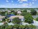Two-story building exterior with lake view and parking at 10263 Gandy Blvd N Blvd # 2005, St Petersburg, FL 33702