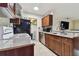 Modern kitchen featuring granite countertops and wood cabinets at 10263 Gandy Blvd N Blvd # 2005, St Petersburg, FL 33702