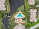 Resort-style community pool, lush landscaping, and condo buildings at 10263 Gandy Blvd N Blvd # 2005, St Petersburg, FL 33702
