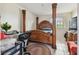 Bedroom with a large wooden bed frame and a home office setup at 10263 Gandy Blvd N Blvd # 2005, St Petersburg, FL 33702