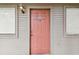 Exterior condo front door with light fixture and windows at 10263 Gandy Blvd N Blvd # 2005, St Petersburg, FL 33702