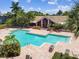 Relaxing community pool with lounge chairs at 10263 Gandy Blvd N Blvd # 2005, St Petersburg, FL 33702