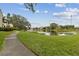 Community path alongside a tranquil lake at 10263 Gandy Blvd N Blvd # 2005, St Petersburg, FL 33702