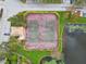 Top-down view of two tennis courts near lake at 10263 Gandy Blvd N Blvd # 2005, St Petersburg, FL 33702