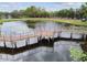 Wooden boardwalk path over calm water with lily pads at 10263 Gandy Blvd N Blvd # 2005, St Petersburg, FL 33702