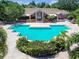 Inviting community pool with spacious deck and surrounding greenery at 10263 Gandy Blvd N Blvd # 2005, St Petersburg, FL 33702