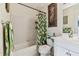 Bathroom with shower/tub, vanity, and tropical decor at 10263 Gandy Blvd N Blvd # 2005, St Petersburg, FL 33702