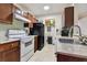 Clean kitchen with wood cabinets and stainless steel appliances at 10263 Gandy Blvd N Blvd # 2005, St Petersburg, FL 33702