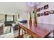 Dining area with table and chairs overlooking living room at 10263 Gandy Blvd N Blvd # 2005, St Petersburg, FL 33702