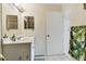 Bathroom with vanity and large mirror at 10263 Gandy Blvd N Blvd # 2005, St Petersburg, FL 33702