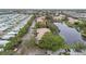 Aerial view showcasing community and lake at 10263 Gandy Blvd N Blvd # 2005, St Petersburg, FL 33702