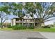 Two-story building with lush landscaping and parking at 10263 Gandy Blvd N Blvd # 2005, St Petersburg, FL 33702