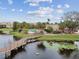 Relaxing pool area with boardwalk access to lake at 10263 Gandy Blvd N Blvd # 2005, St Petersburg, FL 33702