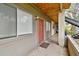 Covered exterior hallway with stairs and lush landscaping at 10263 Gandy Blvd N Blvd # 2005, St Petersburg, FL 33702