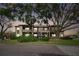 Two-story building with lush landscaping and parking at 10263 Gandy Blvd N Blvd # 2005, St Petersburg, FL 33702