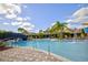 Large community pool with bridge and water features at 20028 Satin Leaf Ave, Tampa, FL 33647