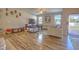 Spacious living room with hardwood floors and plenty of natural light at 20028 Satin Leaf Ave, Tampa, FL 33647