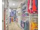 Large walk-in closet with ample storage space at 20028 Satin Leaf Ave, Tampa, FL 33647