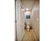 Small half bathroom with toilet and updated flooring at 20028 Satin Leaf Ave, Tampa, FL 33647
