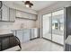Modern kitchen with gray cabinets and stainless steel appliances at 4152 55Th N Way # 1028, Kenneth City, FL 33709