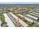 Condo location highlighted in a wide aerial view at 4152 55Th N Way # 1028, Kenneth City, FL 33709