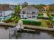 Stunning aerial view of a waterfront home and canal at 4921 Lyford Cay Rd, Tampa, FL 33629