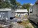 Backyard view of house, RV and shed at 5748 Montana Ave, New Port Richey, FL 34652