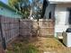 Wooden gate leading to the backyard at 5748 Montana Ave, New Port Richey, FL 34652