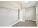 Walk-in closet with shelving and carpet flooring at 6317 Brevada Ln, Apollo Beach, FL 33572