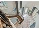 Aerial view of the foyer featuring wood flooring, staircase, and front entrance at 6317 Brevada Ln, Apollo Beach, FL 33572