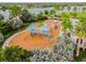 Aerial shot of the neighborhood playground that features slides and play structures at 6317 Brevada Ln, Apollo Beach, FL 33572