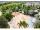 Aerial view of the community splash pad with play features and lounge chairs at 6317 Brevada Ln, Apollo Beach, FL 33572
