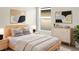 Bedroom with light walls, a dresser, and a queen-sized bed at 7231 Somerset Pond Dr, Ruskin, FL 33573