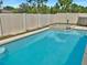 Inviting swimming pool with a spa and private fenced backyard at 7231 Somerset Pond Dr, Ruskin, FL 33573