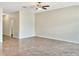Spacious living room with tile floors and ceiling fan at 7231 Somerset Pond Dr, Ruskin, FL 33573