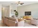 Living room with light walls, hardwood floors, and comfortable seating at 7231 Somerset Pond Dr, Ruskin, FL 33573