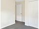 Bedroom featuring carpet, a closet and an additional door at 7231 Somerset Pond Dr, Ruskin, FL 33573