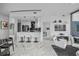 Modern white kitchen with black accents and stainless steel appliances at 777 N Ashley Dr # 2613, Tampa, FL 33602