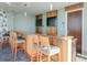Community bar with seating and granite countertop at 777 N Ashley Dr # 2613, Tampa, FL 33602