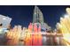 Beautiful building view featuring a modern high-rise with colorful fountains at night at 777 N Ashley Dr # 2613, Tampa, FL 33602