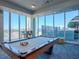 Game room with pool table and large windows at 777 N Ashley Dr # 2613, Tampa, FL 33602