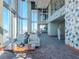 Modern building lobby with comfortable seating and city views at 777 N Ashley Dr # 2613, Tampa, FL 33602