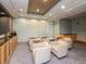 Media room with comfortable seating and large screen TV at 777 N Ashley Dr # 2613, Tampa, FL 33602