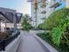 Lush courtyard with a relaxing path and modern building at 777 N Ashley Dr # 2613, Tampa, FL 33602