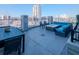 Rooftop terrace with seating, fire pit, and city view at 777 N Ashley Dr # 2613, Tampa, FL 33602