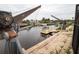 Private boat lift and dock with canal access at 9830 San Sierra Way, Port Richey, FL 34668